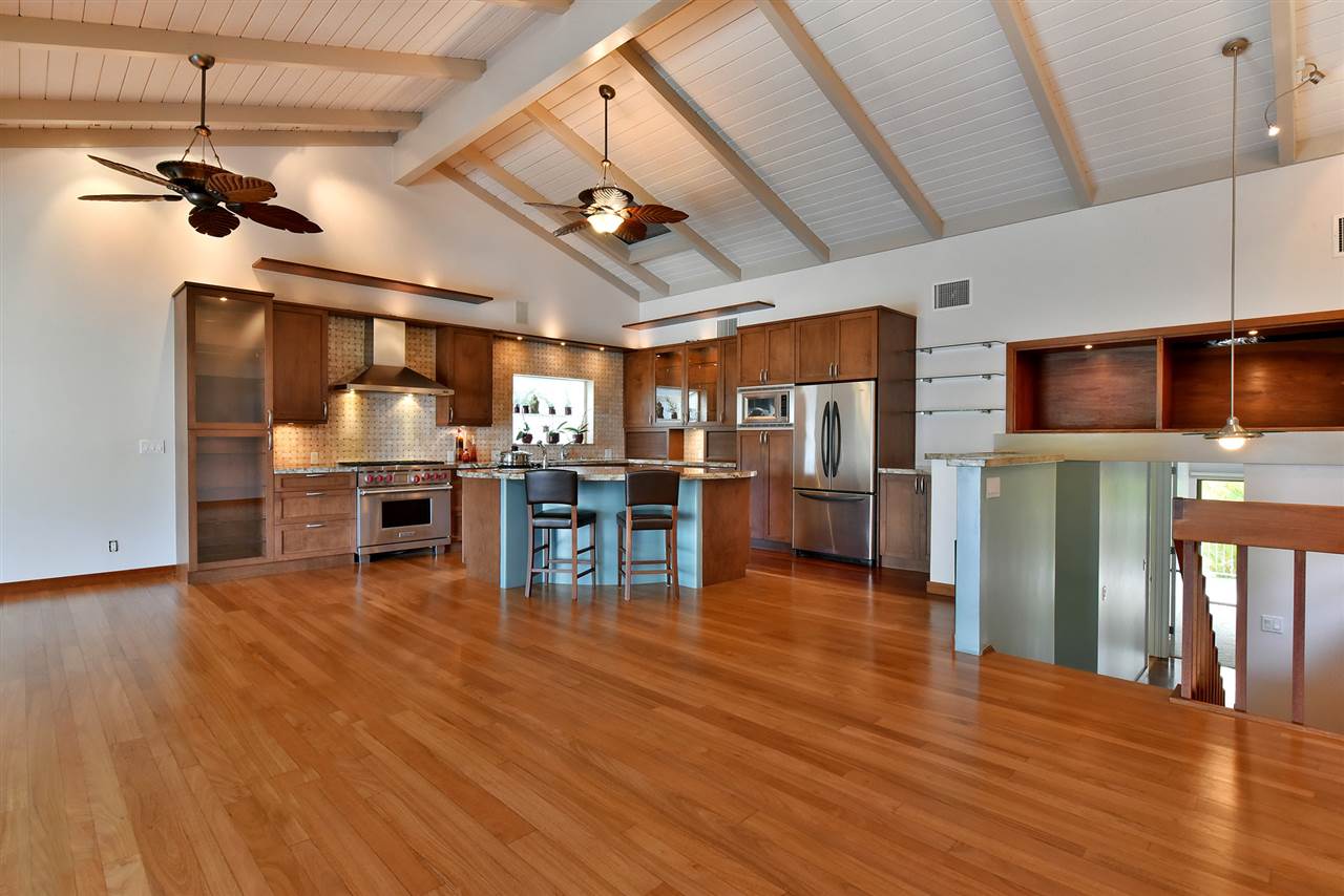 5045 Lower Honoapiilani Road, Unit HOUSE #5 Lahaina, HI 96761 - Photo 11 of 30 a view of a room with furniture and wooden floor