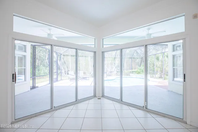 a view of an empty room and window