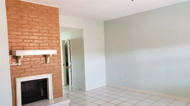 a view of a livingroom with a fireplace