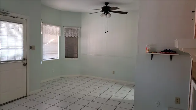 a view of a room that has a window in it