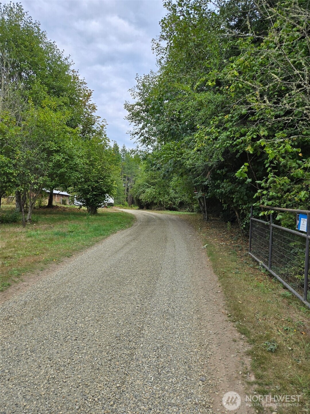 1725 Winlock-Vader Road Winlock, WA 98596 - Photo 6 of 8 a view of a field with trees in the background