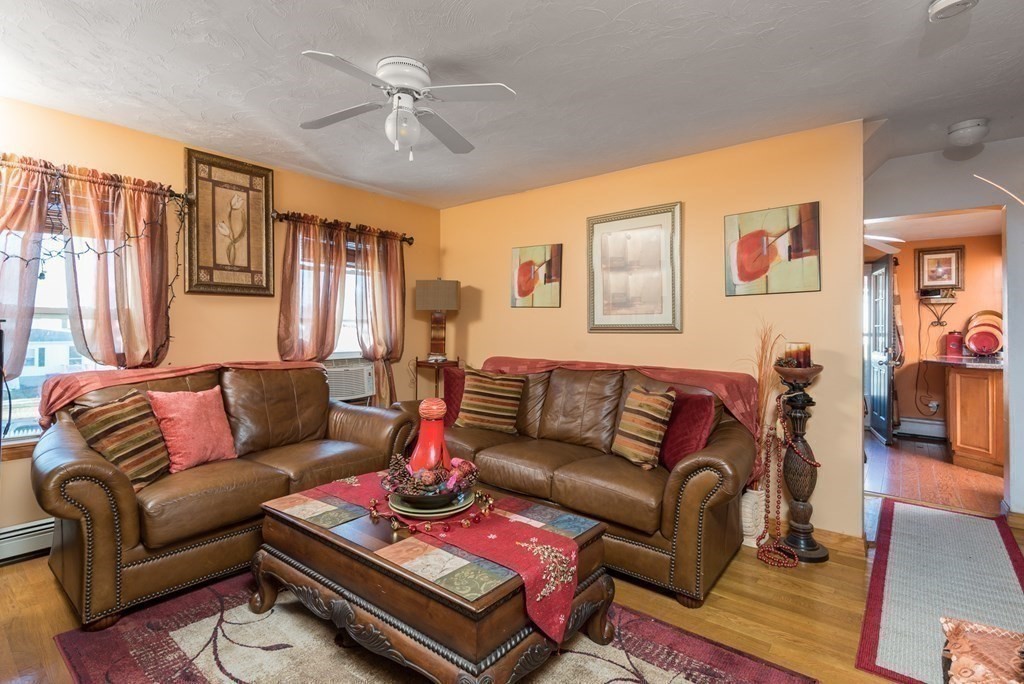 14 Sumner Street Taunton, MA 02780 - Photo 15 of 22 a living room with furniture and a large window