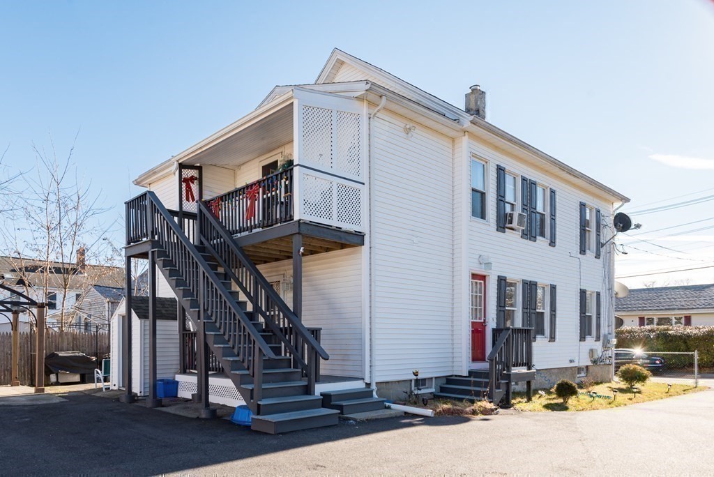 14 Sumner Street Taunton, MA 02780 - Photo 20 of 22 a front view of a building with street