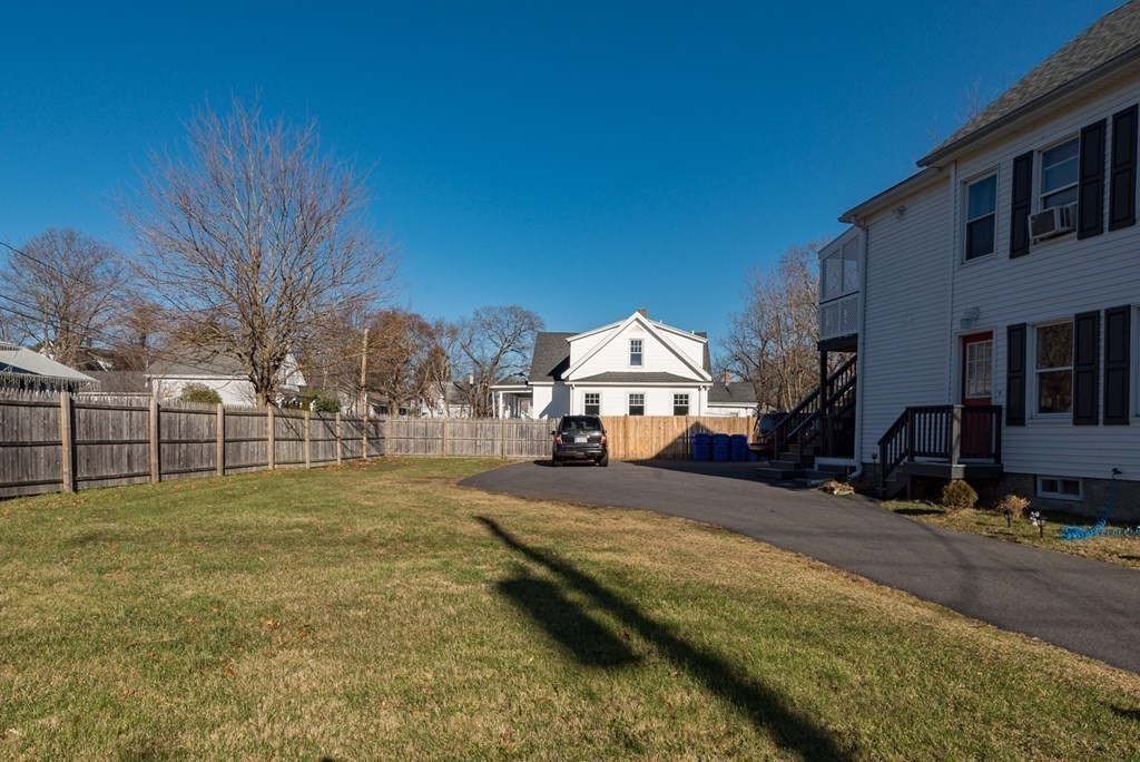 14 Sumner Street Taunton, MA 02780 - Photo 22 of 22 a view of a yard with a house