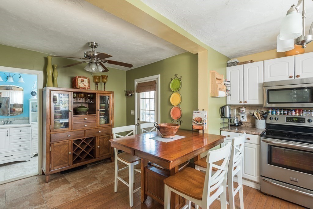 14 Sumner Street Taunton, MA 02780 - Photo 4 of 22 a view of a dining room with furniture and wooden floor