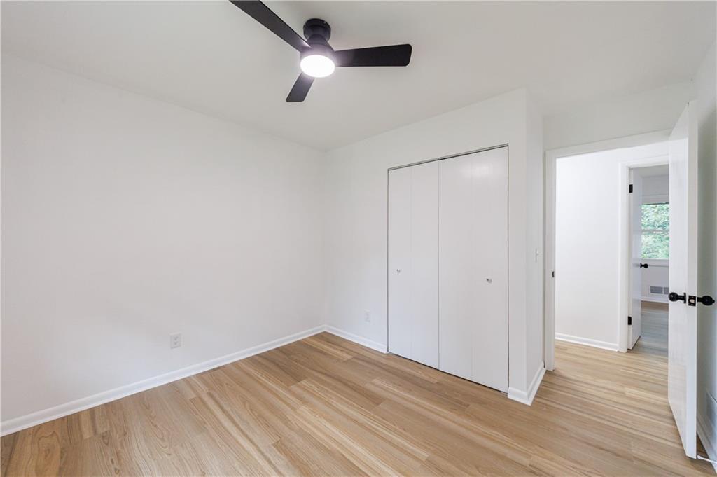4360 Sasanqua Court Tucker, GA 30084 - Photo 21 of 37 wooden floor in an empty room