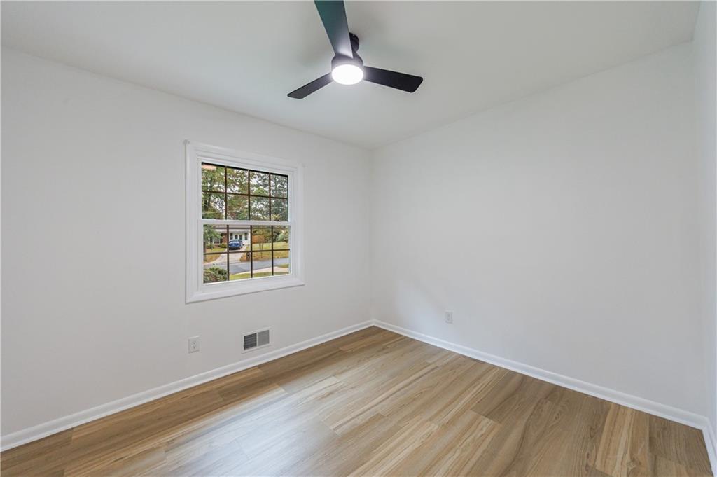 4360 Sasanqua Court Tucker, GA 30084 - Photo 23 of 37 an empty room with a window