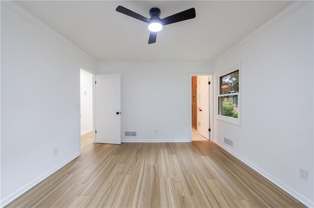 4360 Sasanqua Court Tucker, GA 30084 - Photo 25 of 37 wooden floor in an empty room with a window