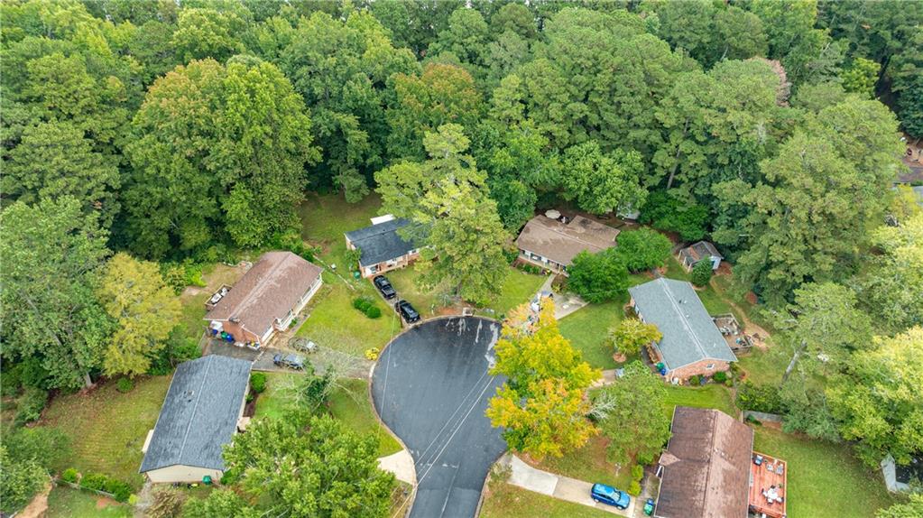 4360 Sasanqua Court Tucker, GA 30084 - Photo 34 of 37 an aerial view of residential house with outdoor space and swimming pool