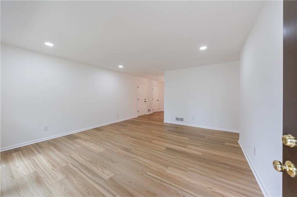 4360 Sasanqua Court Tucker, GA 30084 - Photo 5 of 37 a view of empty room with wooden floor