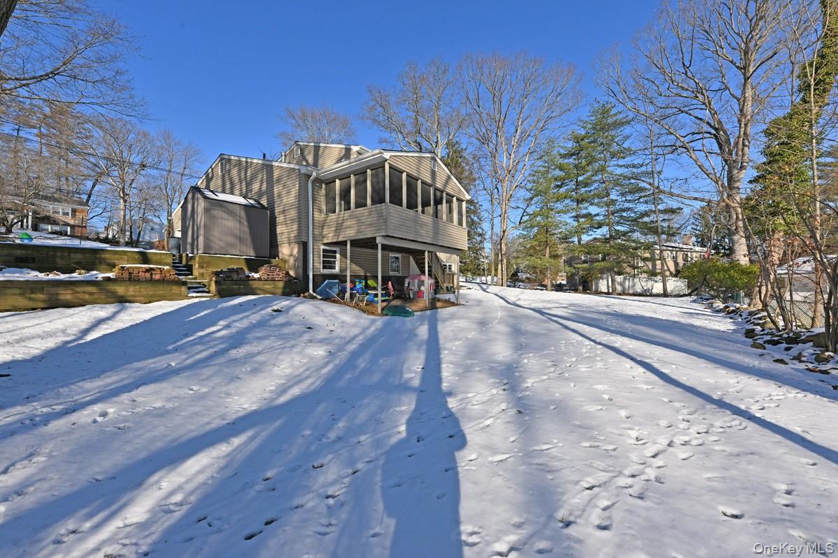 7 Lexington Road New City, NY 10956 - Photo 3 of 36 Snow covered house with a sunroom