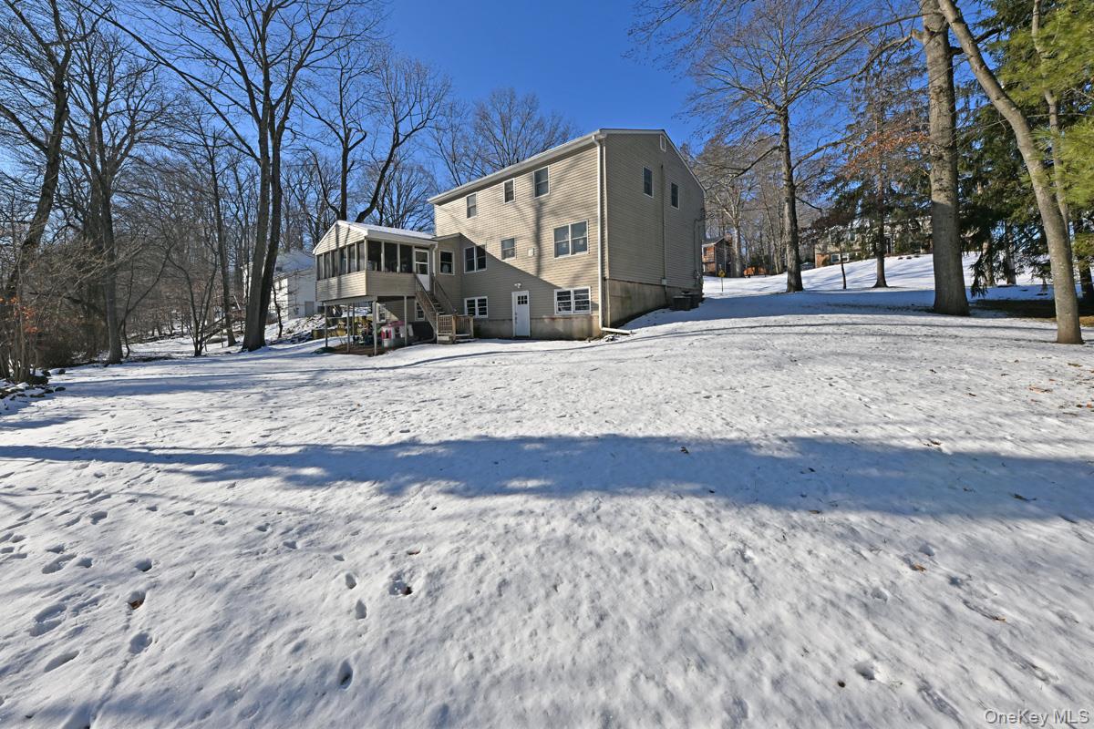 7 Lexington Road New City, NY 10956 - Photo 6 of 36 Snow covered property with stairway