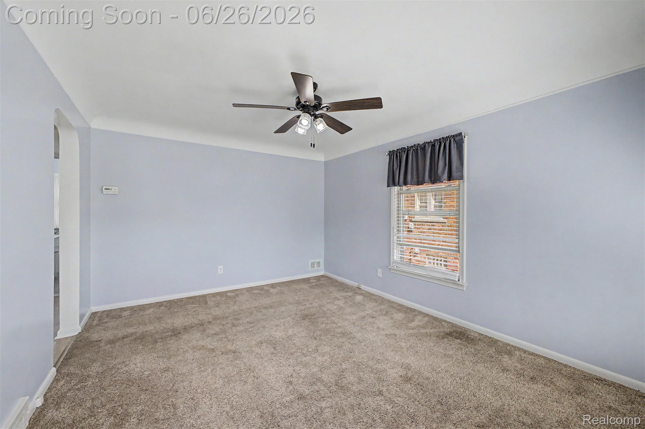 2216 Banner Street Dearborn, MI 48124 - Photo 6 of 34 Carpeted room with light blue walls and white trim