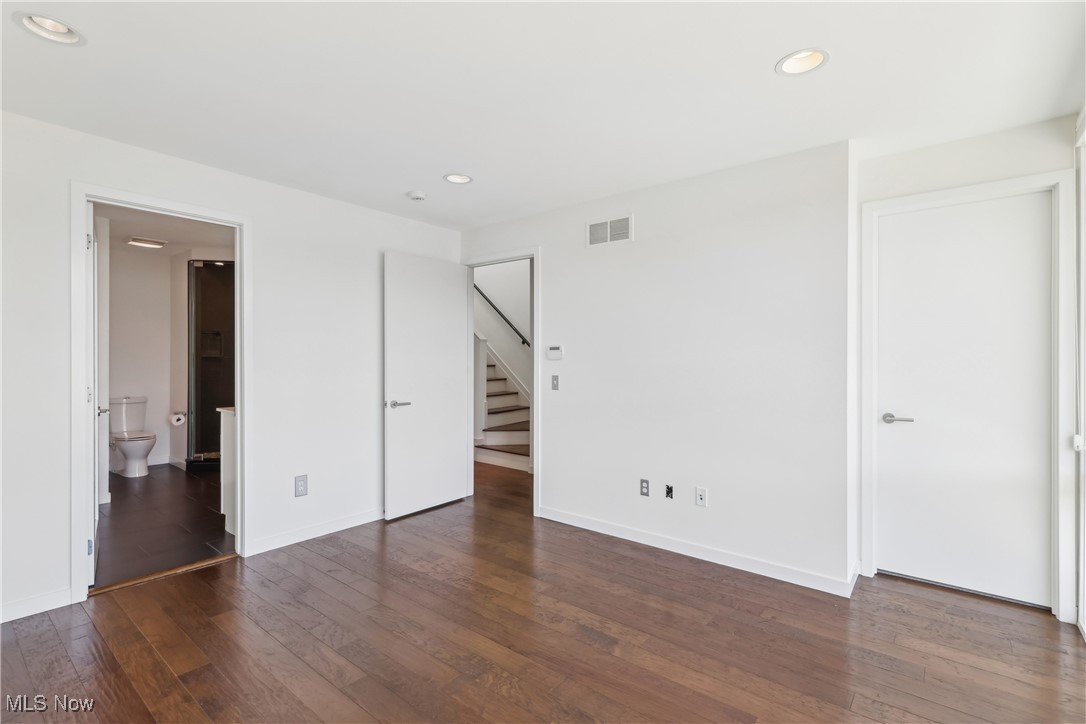 1852 Coltman Road Cleveland, OH 44106 - Photo 19 of 39 Primary bedroom featuring recessed lighting, walk in closet is door to the right.