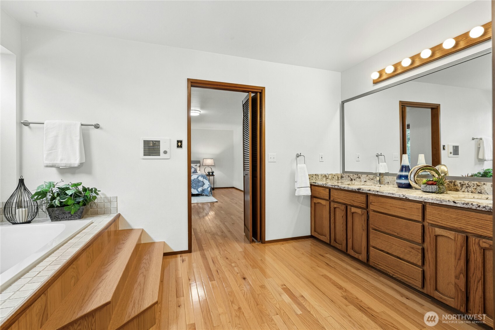 5211 103rd Street Southwest, Unit SW Mukilteo, WA 98275 - Photo 20 of 40 a spacious bathroom with double vanity and a bathtub
