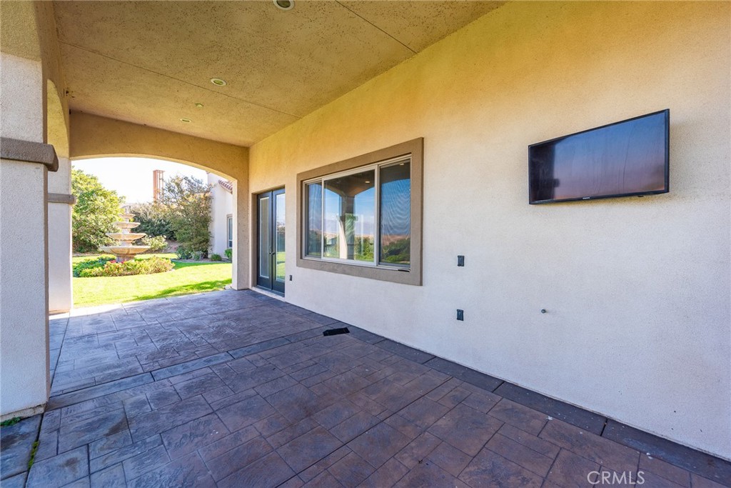 670 Pinnacle Ridge Road Riverside, CA 92506 - Photo 14 of 75 a view of an empty room with a window