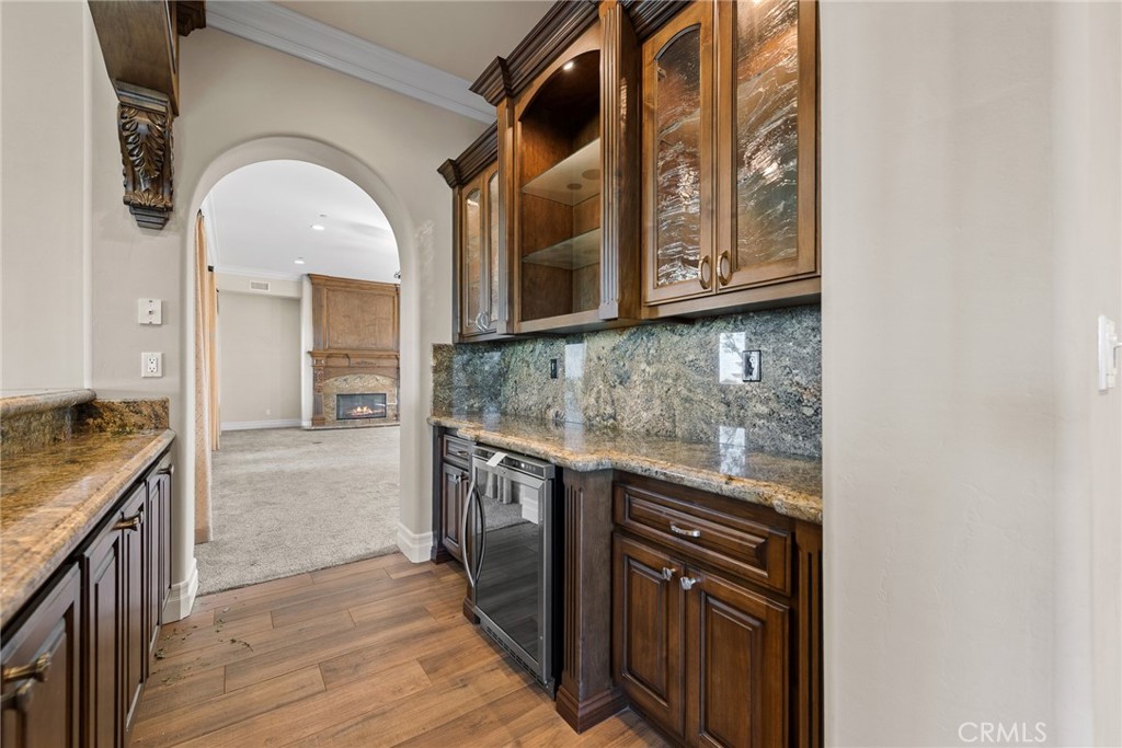 670 Pinnacle Ridge Road Riverside, CA 92506 - Photo 27 of 75 a kitchen with stainless steel appliances granite countertop a stove and a sink