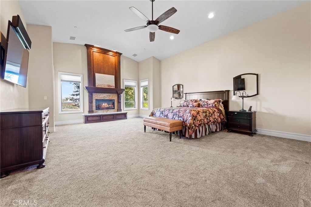 670 Pinnacle Ridge Road Riverside, CA 92506 - Photo 29 of 72 a bedroom with bed and a large window