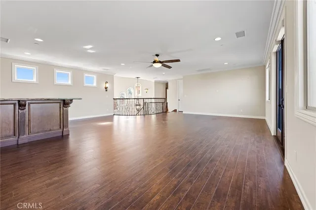 an aerial view of a house with a swimming pool