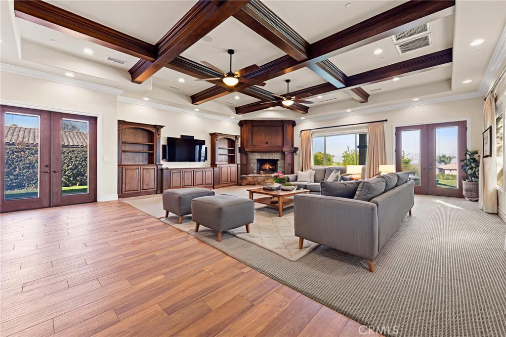 670 Pinnacle Ridge Road Riverside, CA 92506 - Photo 5 of 75 a living room with furniture and a wooden floor