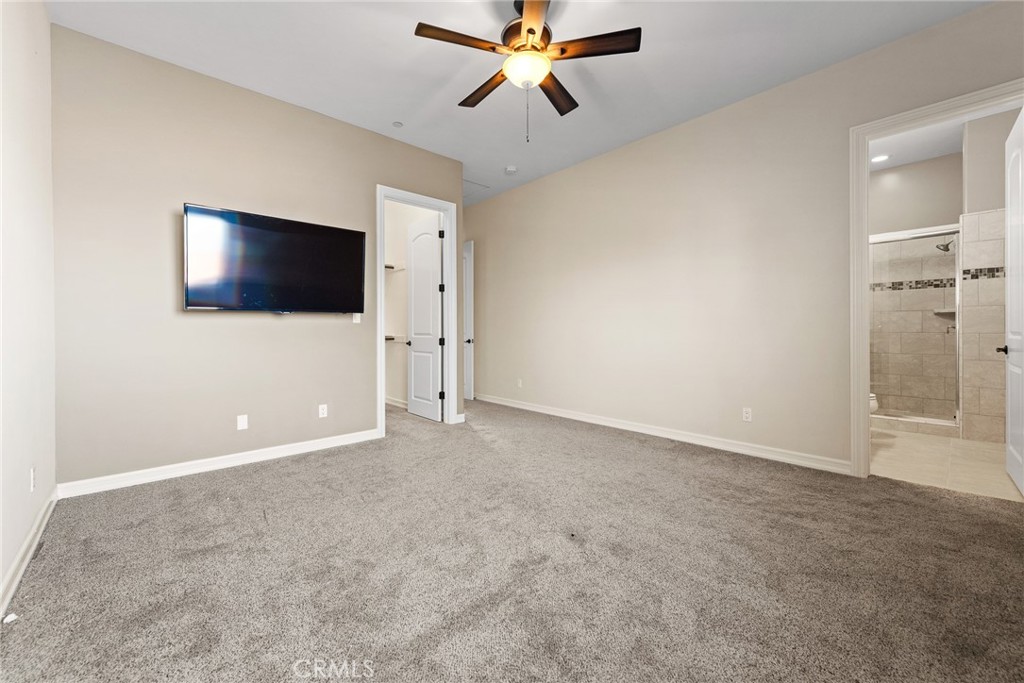 670 Pinnacle Ridge Road Riverside, CA 92506 - Photo 54 of 75 a view of a livingroom with a flat screen tv