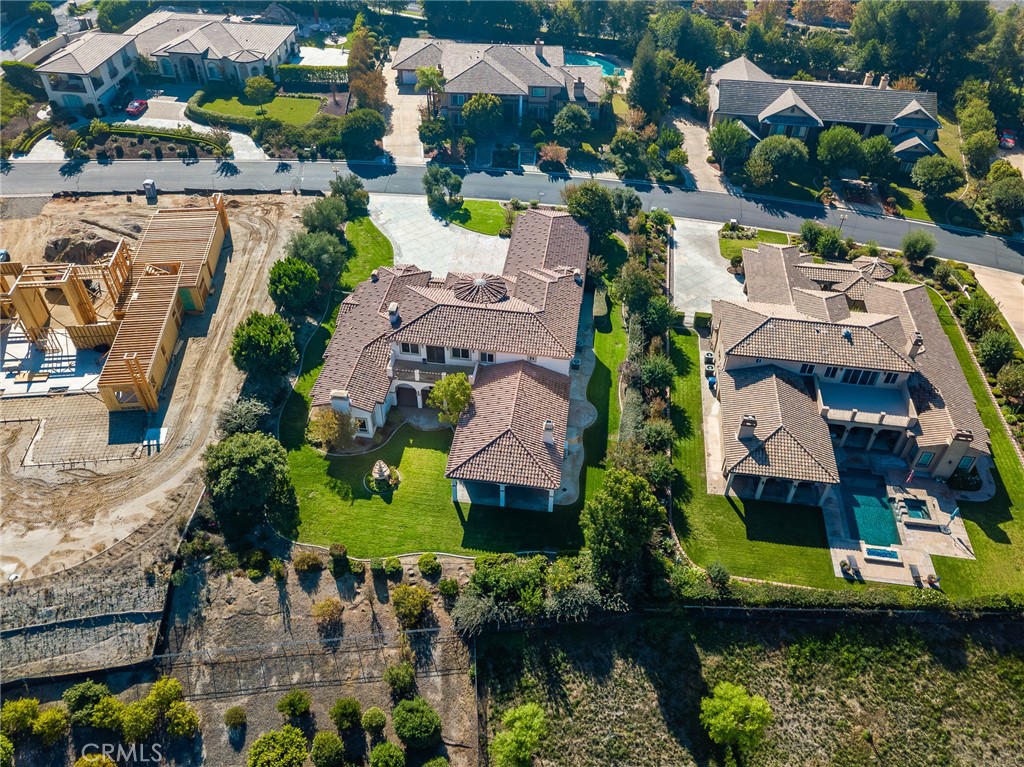 670 Pinnacle Ridge Road Riverside, CA 92506 - Photo 70 of 72 an aerial view of residential houses with outdoor space and swimming pool