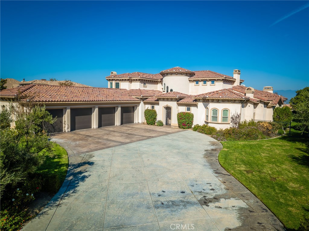 670 Pinnacle Ridge Road Riverside, CA 92506 - Photo 71 of 72 a front view of a house with a garden