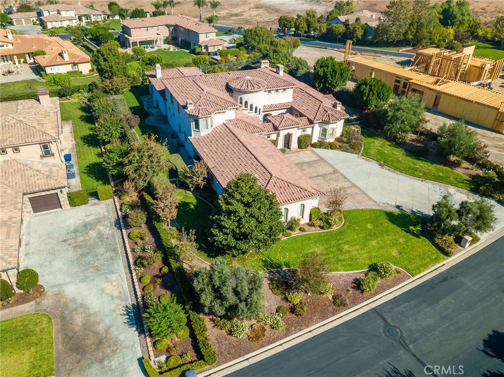 670 Pinnacle Ridge Road Riverside, CA 92506 - Photo 72 of 75 an aerial view of a house with a garden and lake view