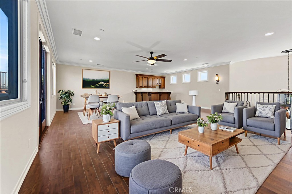 670 Pinnacle Ridge Road Riverside, CA 92506 - Photo 8 of 75 a living room with furniture and wooden floor