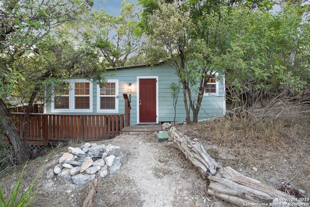 a house with trees in front of it