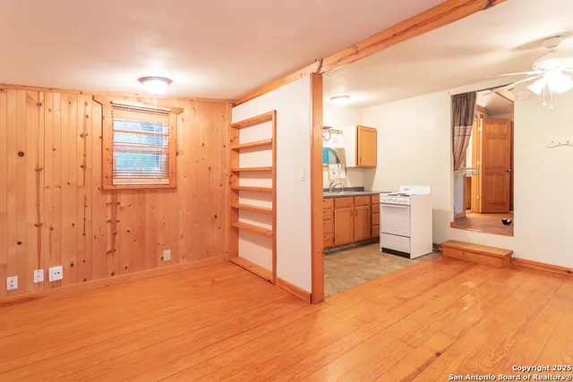 a view of a kitchen with a sink