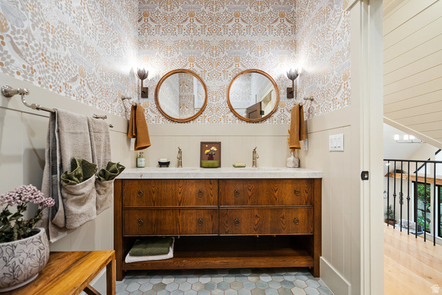1141 South Oak Leaf Lane Springville, UT 84663 - Photo 73 of 147 U{STAIRS Bathroom featuring a dual-sink vanity with a wood-finish cabinet and a light-toned countertop