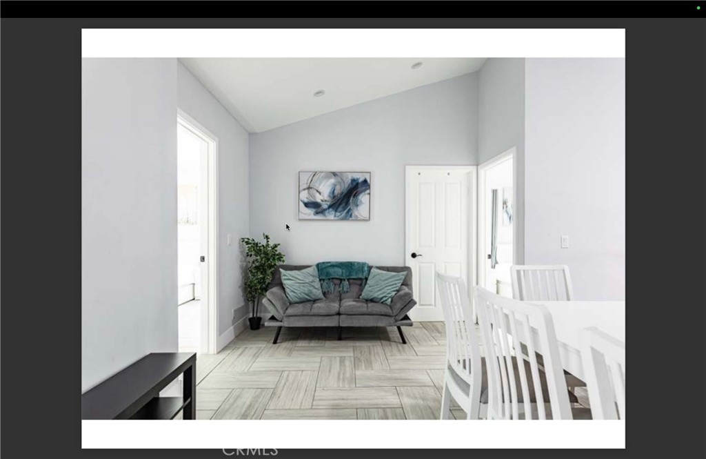 712 North Fuller Avenue West Hollywood, CA 90046 - Photo 21 of 23 a living room with furniture and a wooden floor