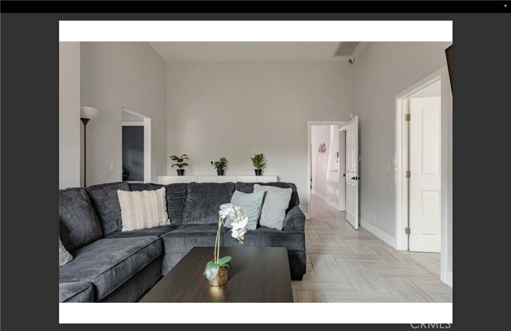 712 North Fuller Avenue West Hollywood, CA 90046 - Photo 3 of 23 a living room with furniture and a wooden floor