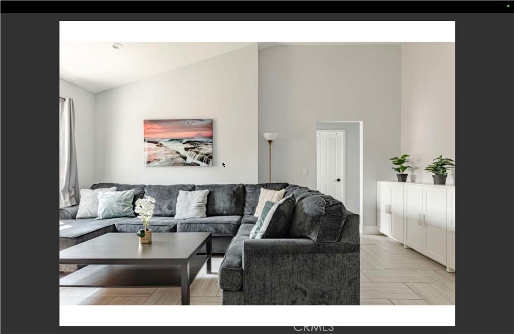 712 North Fuller Avenue West Hollywood, CA 90046 - Photo 4 of 23 a living room with furniture and wooden floor