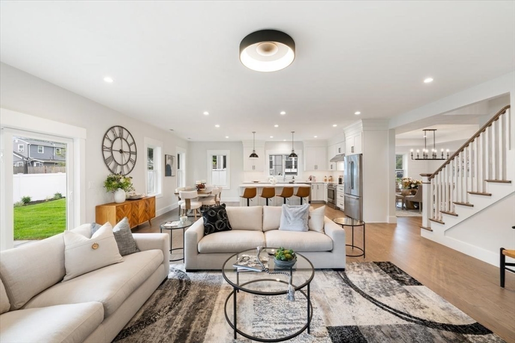 18 Walcott Street Natick, MA 01760 - Photo 17 of 36 a living room with furniture and a table