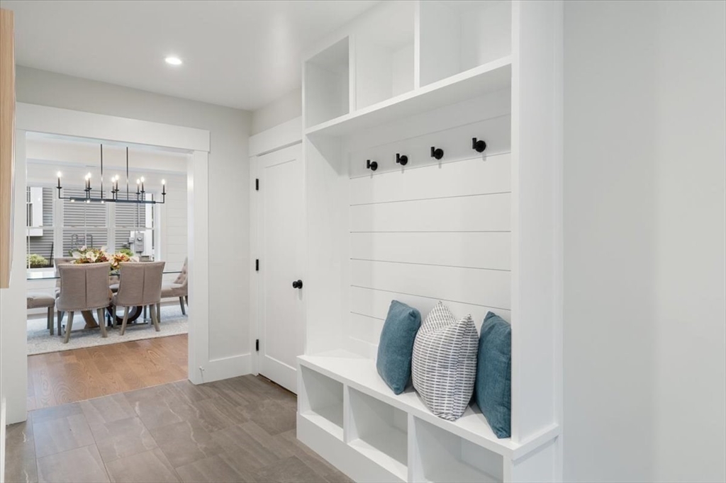 18 Walcott Street Natick, MA 01760 - Photo 22 of 36 a walk in closet with wooden floor