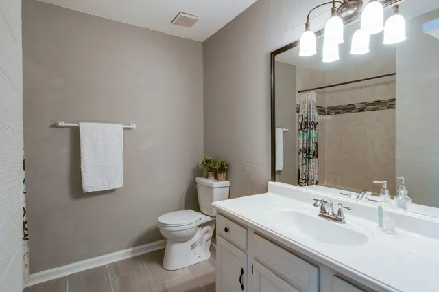 a bathroom with a shower and a bathtub