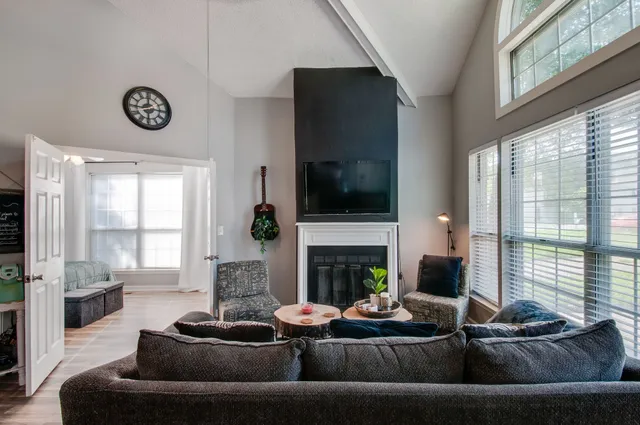 a kitchen with a stove and a refrigerator