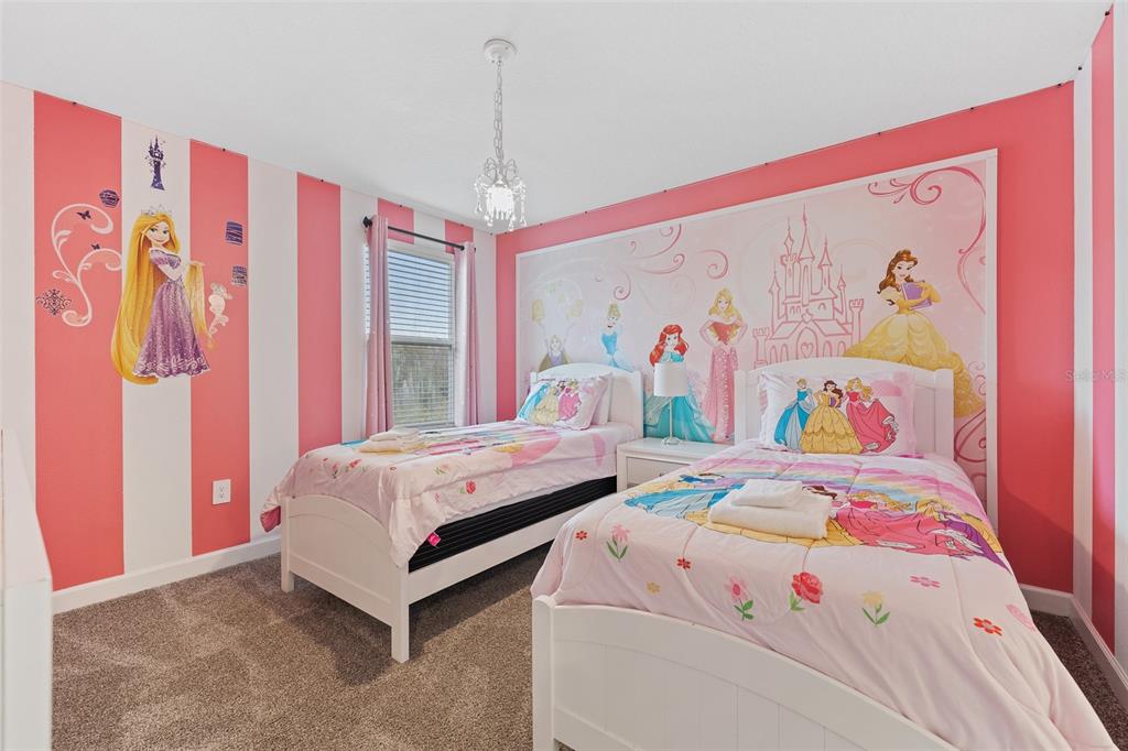 3000 Penelope Loop Kissimmee, FL 34746 - Photo 26 of 53 a bedroom with a bed and a window