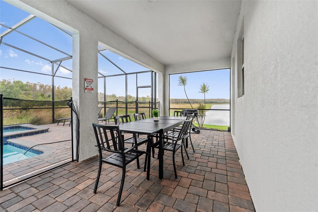 3000 Penelope Loop Kissimmee, FL 34746 - Photo 42 of 53 a dining room with furniture and window