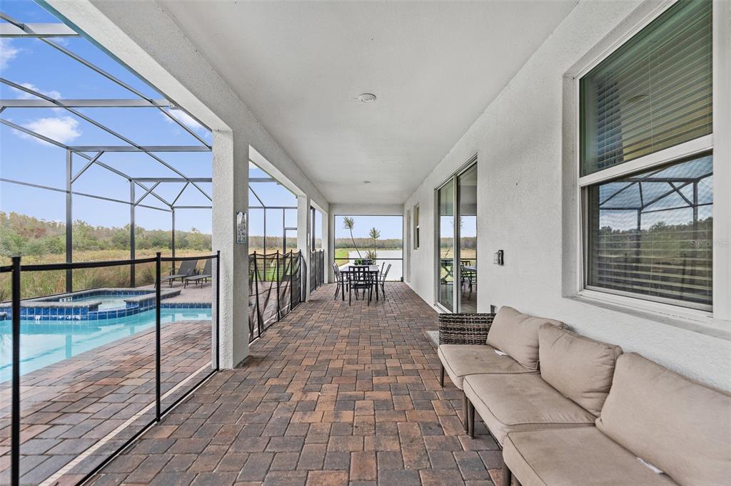 3000 Penelope Loop Kissimmee, FL 34746 - Photo 43 of 53 a view of a patio with a table and chairs