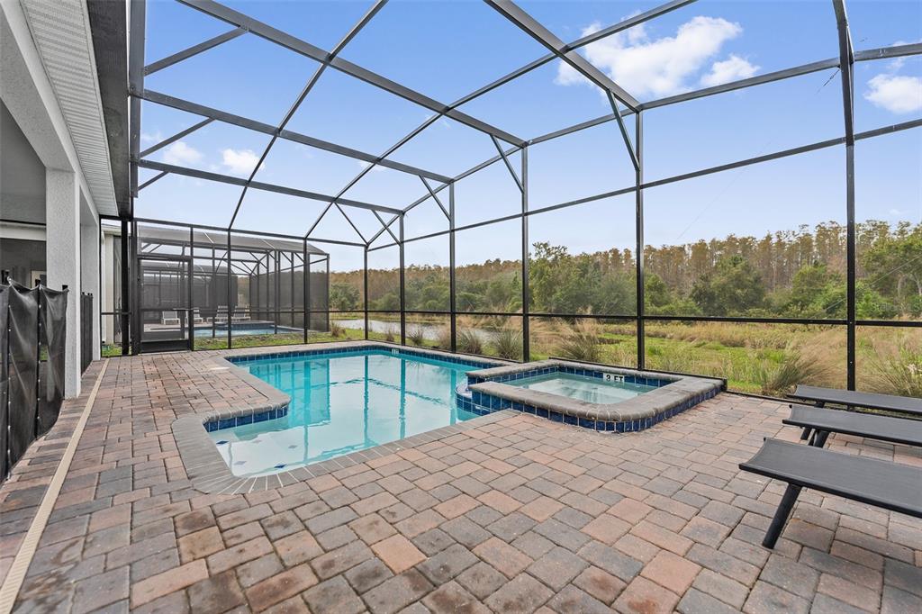 3000 Penelope Loop Kissimmee, FL 34746 - Photo 44 of 53 a view of a swimming pool with a yard