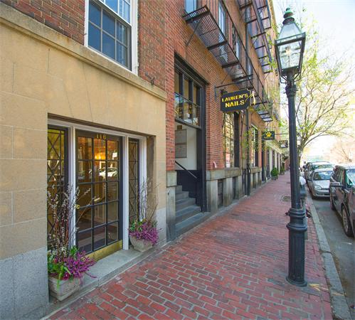 116 Charles Street, Unit 1 Boston, MA 02114 - Photo 7 of 8 a view of a pathway along a building
