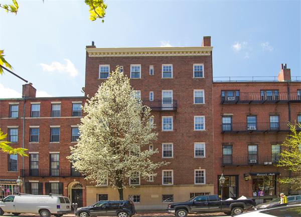 116 Charles Street, Unit 1 Boston, MA 02114 - Photo 8 of 8 a front view of a building with street view