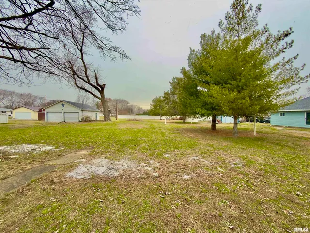 a view of a swimming pool with an outdoor space