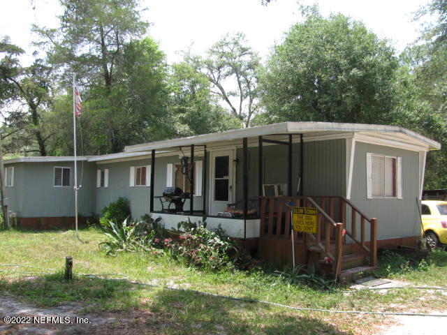 672 Georgetown Denver Road Crescent City, FL 32112 - Photo 6 of 23 HOUSE FRONT VIEW IMG_0212