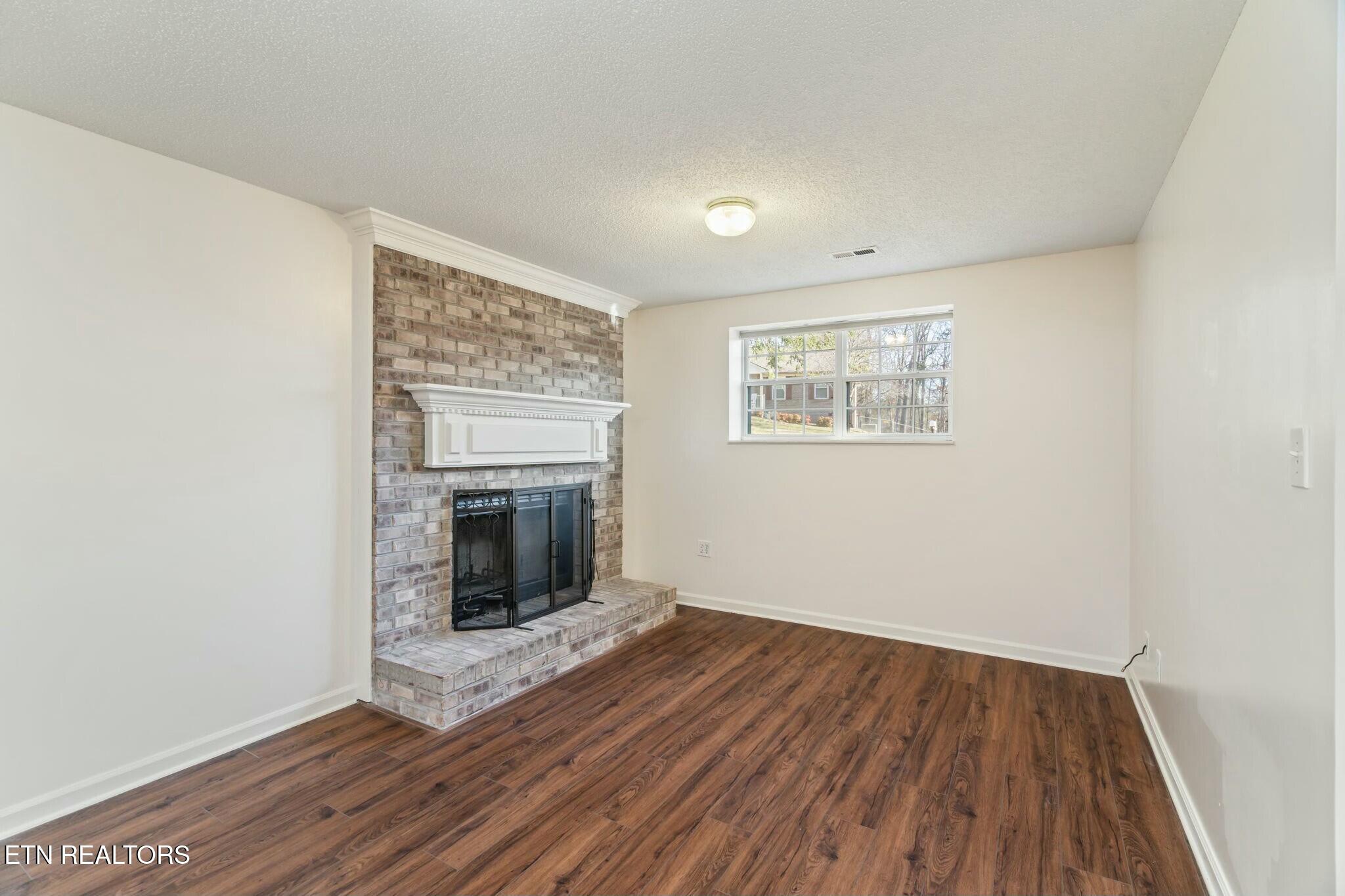7809 Signal Station Road Knoxville, TN 37920 - Photo 29 of 39 Den lower level