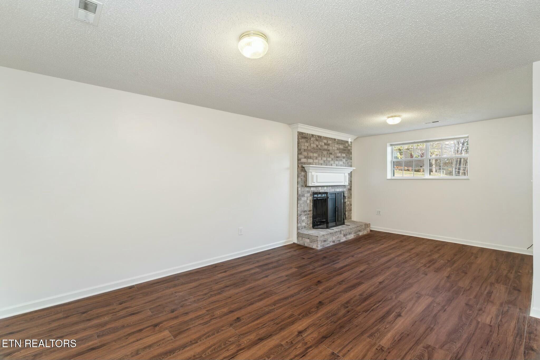 7809 Signal Station Road Knoxville, TN 37920 - Photo 30 of 39 Den lower level