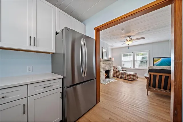 a kitchen with a stove and a microwave